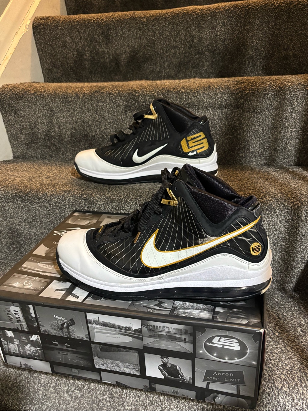 Nike Lebron 7 Sneakers In Black, White, And Gold.